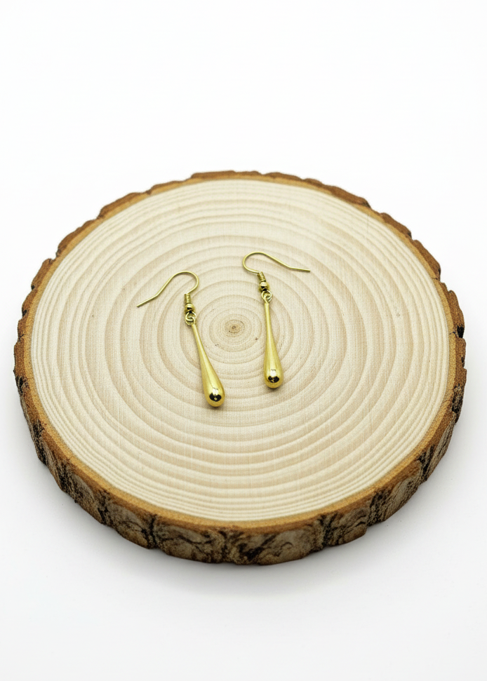 Orecchini Liquid con base legno chiara