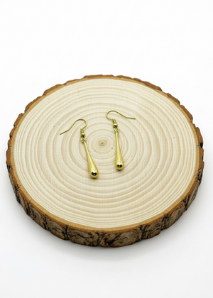 Orecchini Liquid con base legno chiara