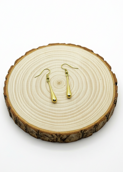 Orecchini Liquid con base legno chiara