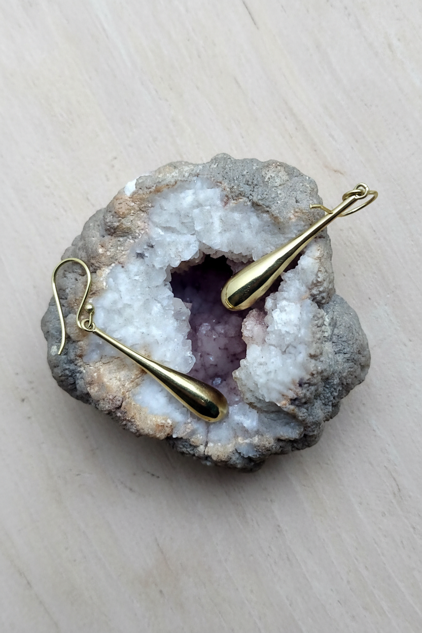 Orecchini liquid con legno chiaro