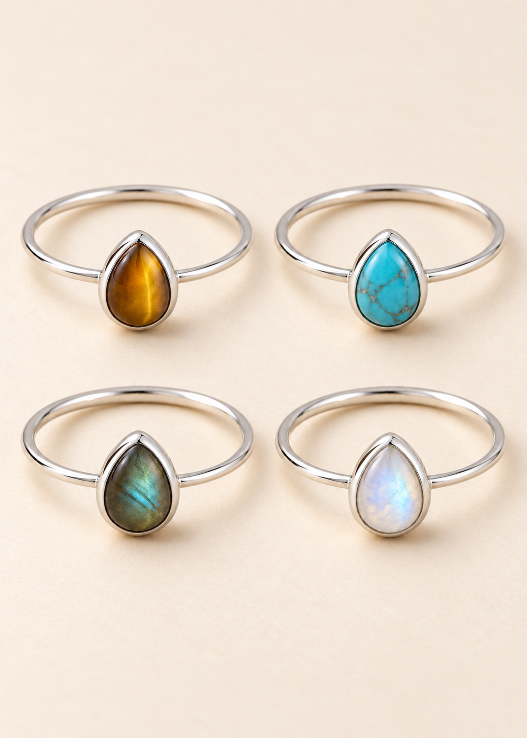 Rugiada Nomade – Anelli in argento nelle varianti occhio di tigre, turchese, labradorite e pietra di luna