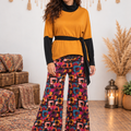 Pantaloni palazzo curvy fantasia Gipsy Leaves - Happy Baba — indossati da Gea, set outlet inverno con parete chiara e macramè